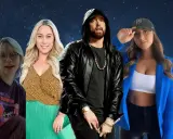 Eminem w czarnej kurtce i złotej biżuterii, otoczony przez trzy kobiety. Czy Eminem ma zone?