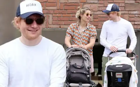 Ed Sheeran z żoną i wózkiem dziecięcym. Czy Ed Sheeran ma dzieci? Tak, widać to na zdjęciu.