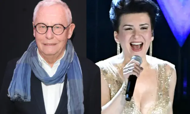Mężczyzna w okularach i szaliku obok kobiety, która śpiewa "Mam tę moc".
